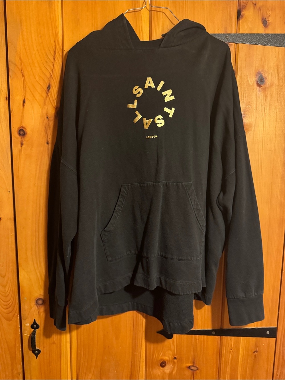 All Saints Black Asymmetrical Hoodie with Gold Logo
